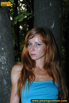 Outdoor pissing in the night of teen redhead girl - N