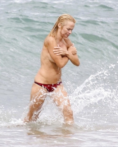 Pamela Anderson Goes Topless on a Beach in France - N