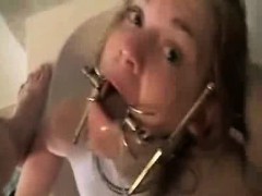 blonde-with-a-mouth-clamp-face-fucked-and-gaggging
