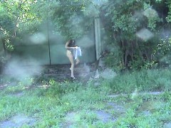 a-sexy-babe-in-a-miniskirt-is-stalked-into-the-forest-on-a