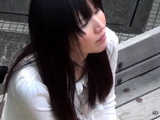 Asian lady pees outdoors