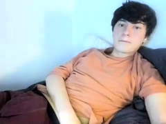 Skinny gay twink enjoys hot solo jerk off on bed